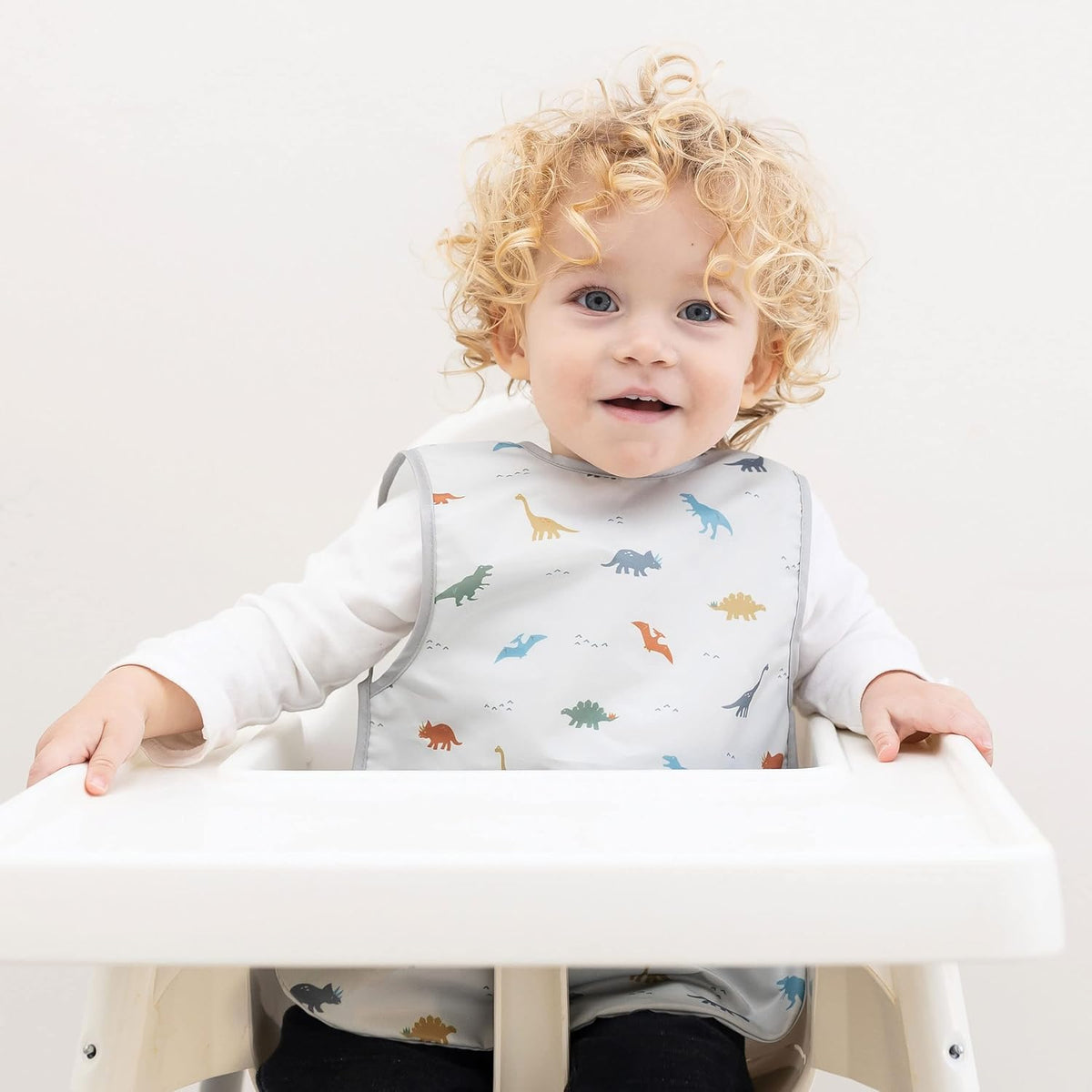 Tiny Twinkle Mess Proof Baby Bib - Waterproof & Lightweight Baby-Led Weaning Apron | 100% Recycled Polyester, Easy Clean & Machine Washable (Dinosaur,Large 2-4 Years)